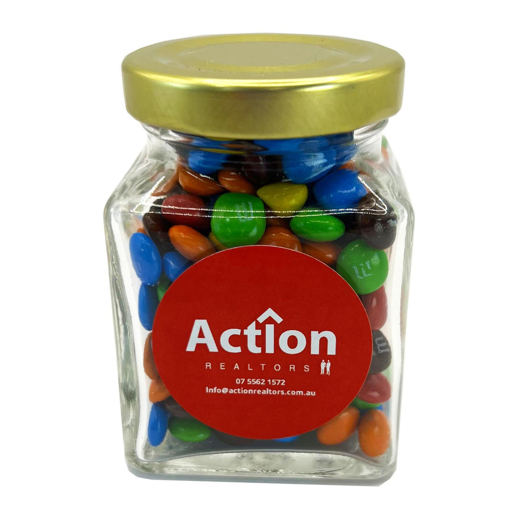 Small Glass Jar with M&Ms 100g - Simply Merchandise